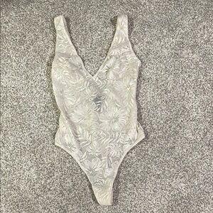 Elegant White Lace Bodysuit